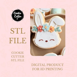 May include: A decorated bunny cookie with a floral crown. The cookie is white with a smiling face, and the crown features orange, blue, and pink flowers. Text on the image reads "STL FILE" and "DIGITAL PRODUCT FOR 3D PRINTING".