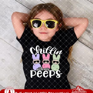 May include: A black t-shirt with a graphic of three cartoon peeps wearing sunglasses and the text "Chillin with my Peeps".