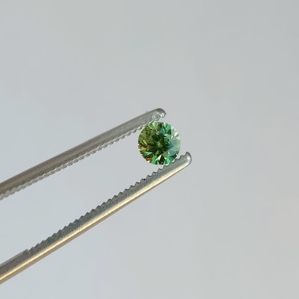 0.3 ct Russian demantoid garnet, faceted demantoid