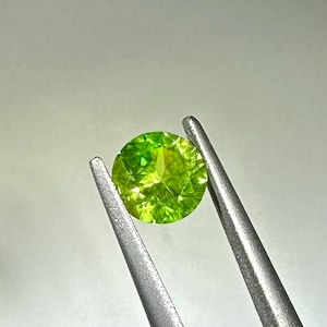 0.55 ct Russian demantoid garnet, faceted demantoid