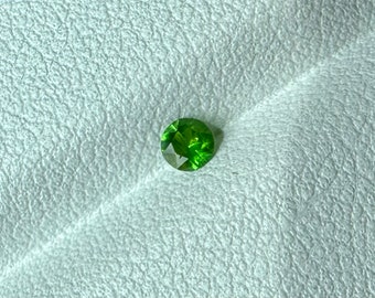 0.12 cts Russian green demantoid garnet,  faceted demantoid