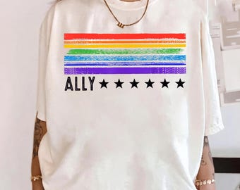 Camiseta unisex divertida con estrellas arcoíris y bandera LGBTQ para el Mes del Orgullo LGBTQ.