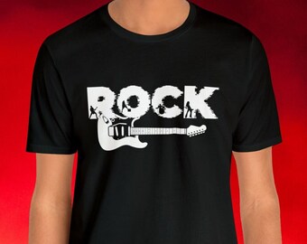 May include: Black t-shirt with a white graphic design featuring the word "ROCK" in a distressed font, with a guitar silhouette and band members incorporated into the letters. The shirt is a classic crew neck.