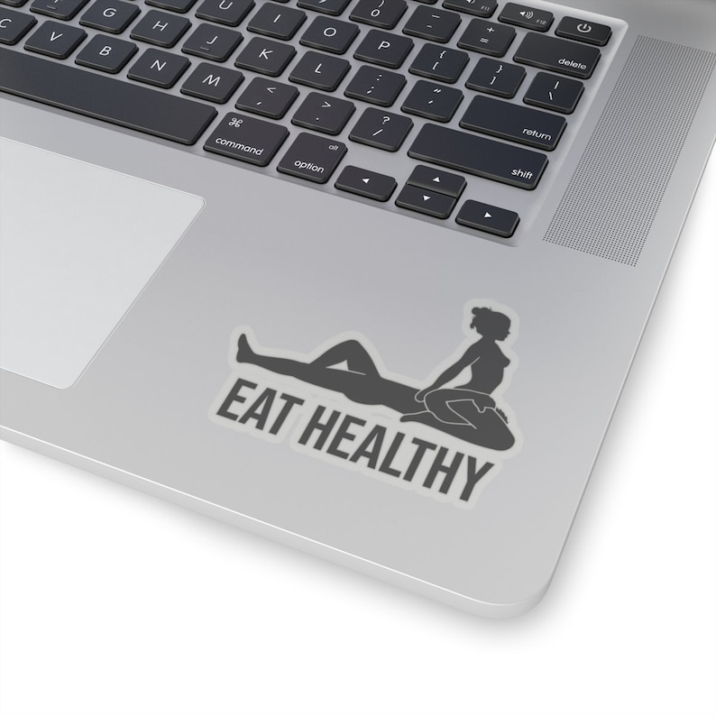 Może przedstawiać: Naklejka z sylwetką dw&oacute;ch os&oacute;b w sugestywnej pozie i tekstem "EAT HEALTHY" wydrukowanym poniżej.