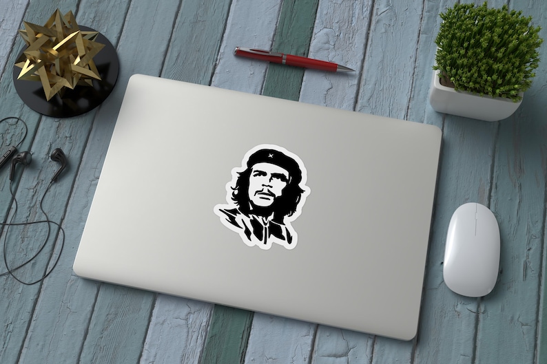 May include: Black and white silhouette sticker of a man with a beard and a beret. The man is looking to the right.