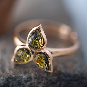 Amber & Gold. Elegant ring. Cognac, green and yellow amber ring. Sterling silver setting. Covered by 14 ct gold. Contemporary ring. Unique.