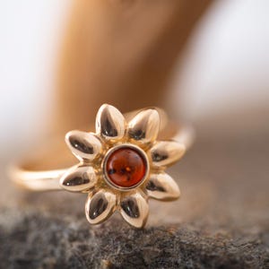 Amber & Gold. Elegant ring. Cognac amber ring. Sterling silver setting. Covered by 14 ct gold. Contemporary ring. Flower ring. Designer ring