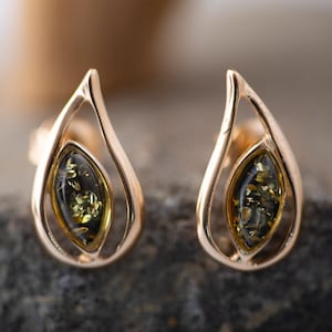 Amber & Gold. Green amber earrings. Elegant studs. Sterling silver setting. Covered by 14 ct gold. Contemporary studs. Unique.Designer studs