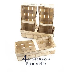 Könnte beinhalten: Set aus vier geflochtenen Körben aus natürlichen Materialien. Die Körbe sind rechteckig und haben eine natürliche Holzfarbe. Der Text "4er Set (Groß) Spankörbe" ist im Bild sichtbar.