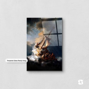May include: A tempered glass wall art print of a painting depicting a ship caught in a stormy sea. The ship is being tossed about by the waves, and the people on board are struggling to stay afloat. The painting is done in a dark and dramatic style, with a sense of urgency and danger.