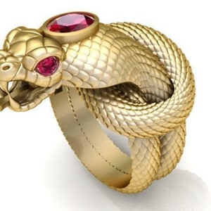 May include: A gold snake ring with red gemstone eyes. The snake is coiled around the band, creating a knot-like design.