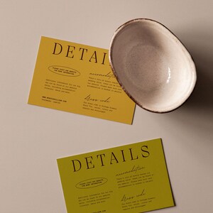 May include: Two yellow cards with the word "DETAILS" in black text. The cards have information about a wedding, including the website, dress code, and accommodation details.