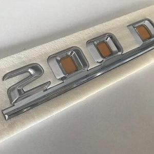 200D  Boot Lid Lettering – Fits Mercedes W124 – Chrome – A1248171215 – NEW