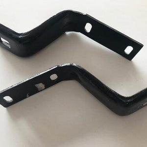 Mercedes W123 Rear bumper bracket left + right A1238850714 and A1238850814 NEW