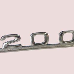 200 Luggage Compartment Emblem – Fits Mercedes W115 Sedan – Nameplate Lettering – NEW