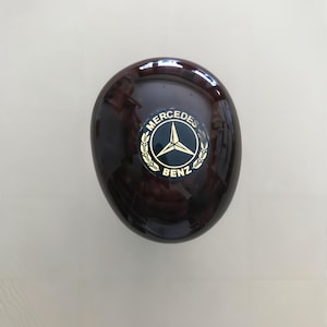 Mercedes Gear Knob – Manual Transmission – Fits W115 W108 W123 W124 W201 – Burl Wood with Emblem – NEW