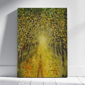 May include: A rectangular canvas painting depicting a tree-lined path with a dense canopy of yellow and green leaves. The ground is covered in fallen golden foliage, creating a bright, sunlit tunnel effect that recedes into the distance.