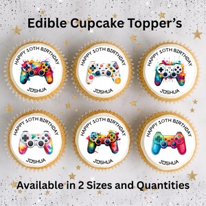 May include: Six round edible cupcake toppers featuring colourful video game controller illustrations, the text HAPPY 10TH BIRTHDAY, and the name JOSHUA. The toppers are displayed on cupcakes with a white background featuring gold star accents.