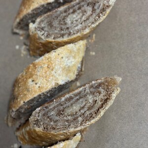 Trini Coconut Rolls | Flaky pastry | Trinidad snacks | Trini desserts | Holiday treats | Trinidad food | coconut rolls, West Indian desserts