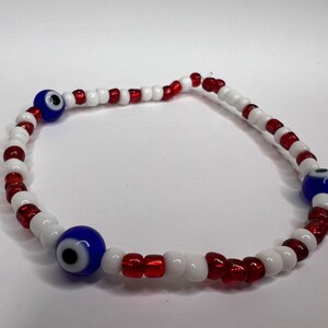 Dominican Flag with Royal Blue Nazar (Evil Eye)