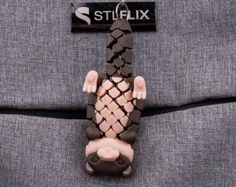 3D Printed Flexi Otter Keychain: Adorable Fidget Charm for Animal Lovers and Nature Enthusiasts