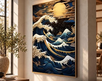 May include: A framed wall art piece featuring a layered paper-cut style illustration of a large ocean wave in deep blue, white, and gold tones under a bright yellow full moon. The artwork is displayed on a wall with a gold light fixture above.