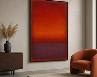 May include: A large rectangular wall art piece featuring a color field composition with a vibrant red-orange upper section and a deep purple lower section, enclosed in a thin black frame. The artwork is displayed on a neutral-toned wall.
