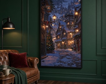 May include: A rectangular framed wall art print depicting a snowy village scene at twilight. The image features timber-framed houses covered in snow, glowing warm street lamps, and a decorated Christmas tree along a cobblestone path.