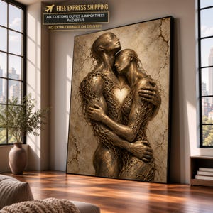 May include: A rectangular wall art print featuring two bronze-toned figures in a close embrace. The figures are intertwined with thin, vine-like structures, and a glowing white heart shape is visible in the center of their chests.