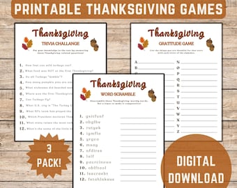 May include: Three printable Thanksgiving game cards with a brown woodgrain background. The cards are titled "Thanksgiving Trivia Challenge", "Thanksgiving Gratitude Game", and "Thanksgiving Word Scramble". Each card has a different game format with instructions and blank spaces for players to fill in.