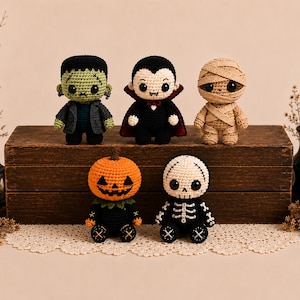 May include: Five small crochet dolls featuring Halloween characters: a green monster with a dark jacket, a vampire in a black cape, a tan wrapped mummy, an orange pumpkin-headed figure, and a black and white skeleton with stitched details.