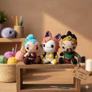 May include: Three handmade crochet dolls with unique character designs. The dolls feature vibrant colors, including blue, orange, and green, and are displayed on a wooden shelf. A tag reads "Handmade with Love."
