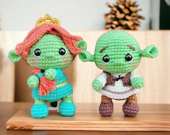 Ensemble de peluches amigurumi faites main de couple d'ogres verts, créatures fantastiques au crochet pour cadeau, décoration ou collection, ensemble unique de poupées faites main