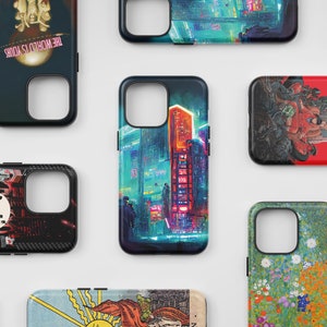 May include: Assortment of phone cases with various designs, including a cityscape, a red and black graphic, a floral pattern, and a tarot card. The cases are all black with a clear window for the camera lens.