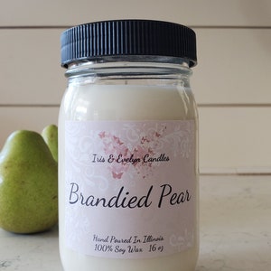 Brandied Pear candle, crafted with the finest natural ingredients to bring the warm and inviting scent of ripe pears infused with brandy to your home. Made with premium soy wax and essential oils, our candles offer a clean and long-lasting burn.