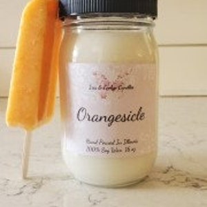 Orangesicle candle, inspired by the classic summer treat! This vibrant and refreshing candle combines the tangy sweetness of ripe oranges with the richness of vanilla, creating an aroma that will transport you straight to a sunny day.