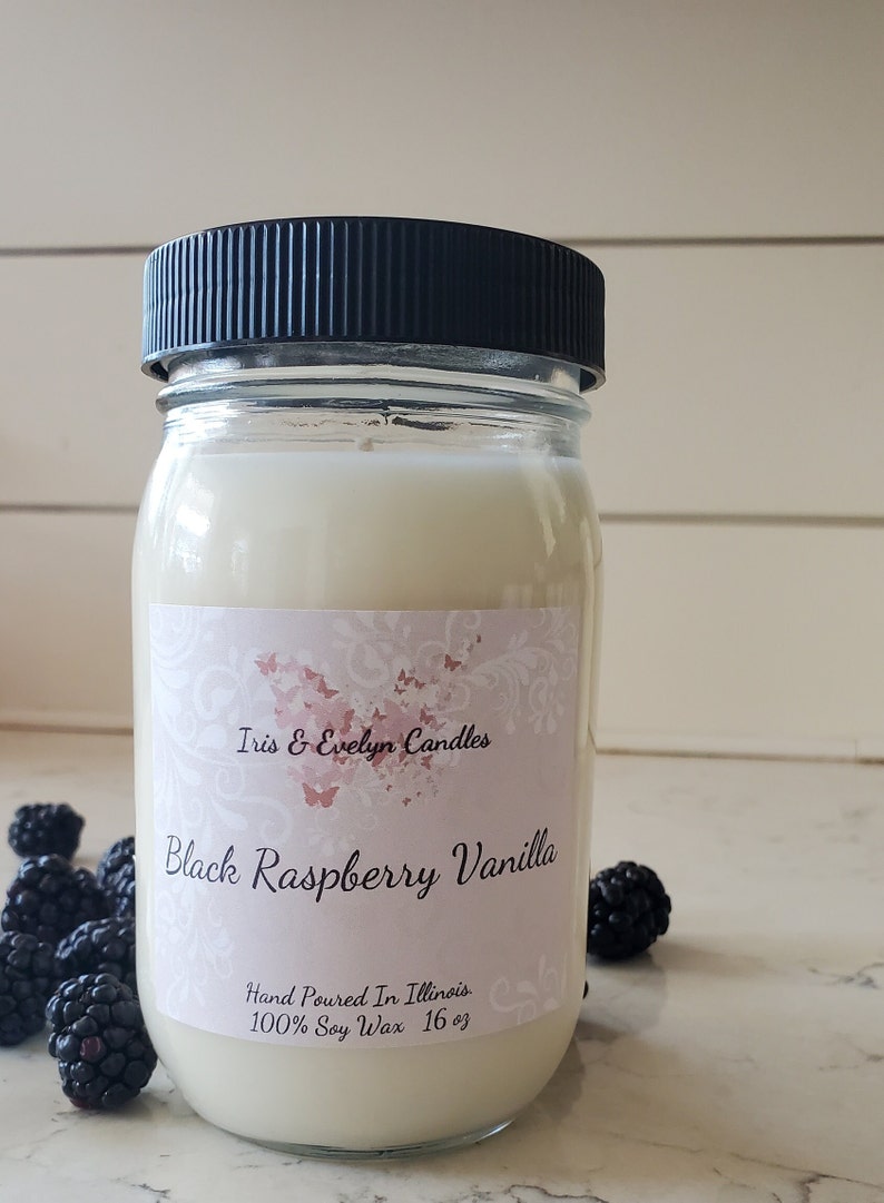 Black Raspberry Vanilla scented candle. This candle features the scent of ripe black raspberries blended with the sweet aroma of vanilla.  Made with high-quality soy wax and a cotton wick, this candle burns cleanly and evenly for hours.