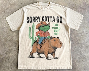 Cowboy Frog Riding Capybara Shirt, The Vibes Are Off Weird Tee, Vintage Style Western Tee, Sarcastic Wild West Graphic, Animal Lover Gift