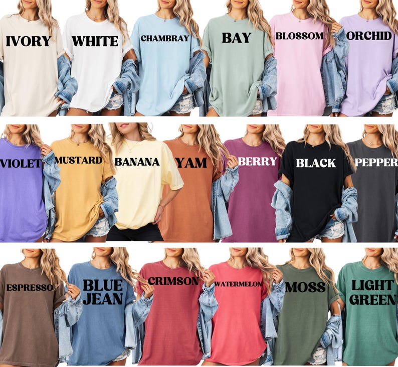 May include: A collection of oversized t-shirts in various colors, including ivory, white, chambray, bay, blossom, orchid, violet, mustard, banana, yam, berry, black, pepper, espresso, blue jean, crimson, watermelon, moss, and light green. Each shirt has a different color name printed on it.