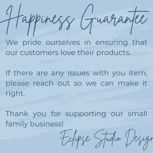 May include: A light blue background with the words "Happiness Guarantee" in elegant script. The text below states a commitment to customer satisfaction and support for a small family business. The design includes the "Eclipse Studio Design" logo.