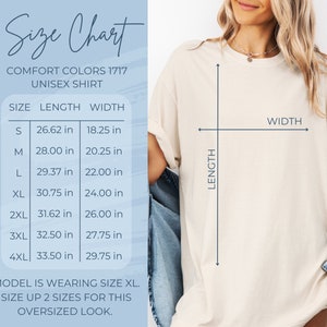 May include: Size chart for a unisex t-shirt in Comfort Colors 1717. The chart shows the length and width in inches for sizes S, M, L, XL, 2XL, 3XL, and 4XL. The model is wearing size XL and the text recommends sizing up two sizes for an oversized look.