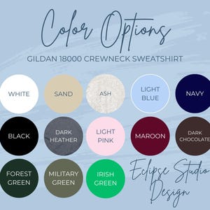 May include: Color options for a Gildan 18000 crewneck sweatshirt. The colors include white, sand, ash, light blue, navy, black, dark heather, light pink, maroon, dark chocolate, forest green, military green, and Irish green.