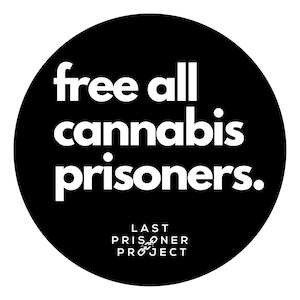 May include: Black and white circle with the text "free all cannabis prisoners."  The text "LAST PRISONER PROJECT" is below the main text.