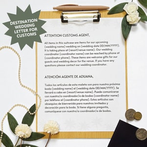 May include: A printable wedding customs letter in English and Spanish. The letter is on a clipboard with a white background and a wooden frame. The text reads "Destination Wedding Letter for Customs" and "Attention Customs Agent". The letter explains that the suitcase contains items for an upcoming wedding and provides contact information for the wedding coordinator.