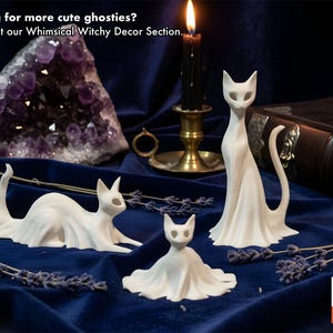 A promotional photo of the original matching cat ghost statue trio. Add these to your collection for a complete whimsigoth Halloween setup.