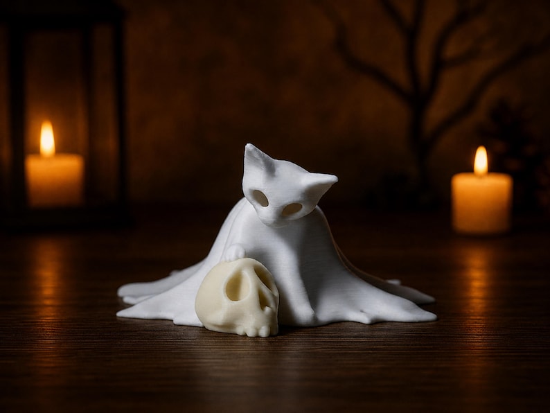 An eye-level close-up of the creepy cute kitten ghost statue looking at a skull, serving as a macabre feline accent for an October aesthetic.