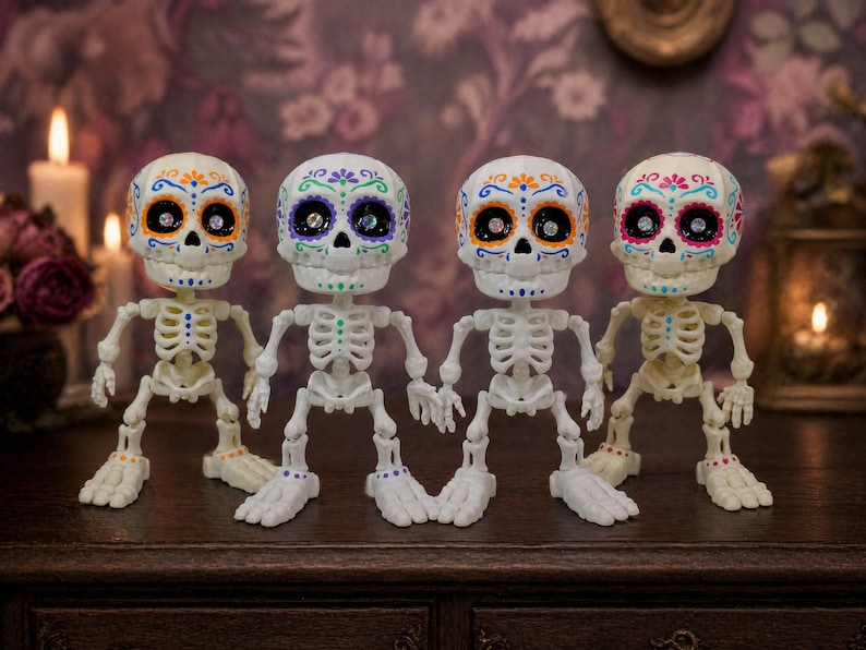 Four vibrant calavera art pieces standing side by side against a striking purple wallpaper background. This lineup displays the beautiful color variations of this creepy cute pastel goth desk buddy. As an articulated skeleton ADHD fidget tool for office spaces, it brings a massive pastel goth vibe to any maximalist cubicle. A fantastic tactile sensory item and ready to ship goth gift that doubles as incredibly fun dopamine decor for your space.