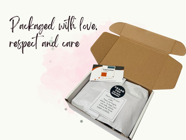 A neatly wrapped white gift box showing the shop's careful packaging, ready to arrive safely as an ideal Christmas gift.