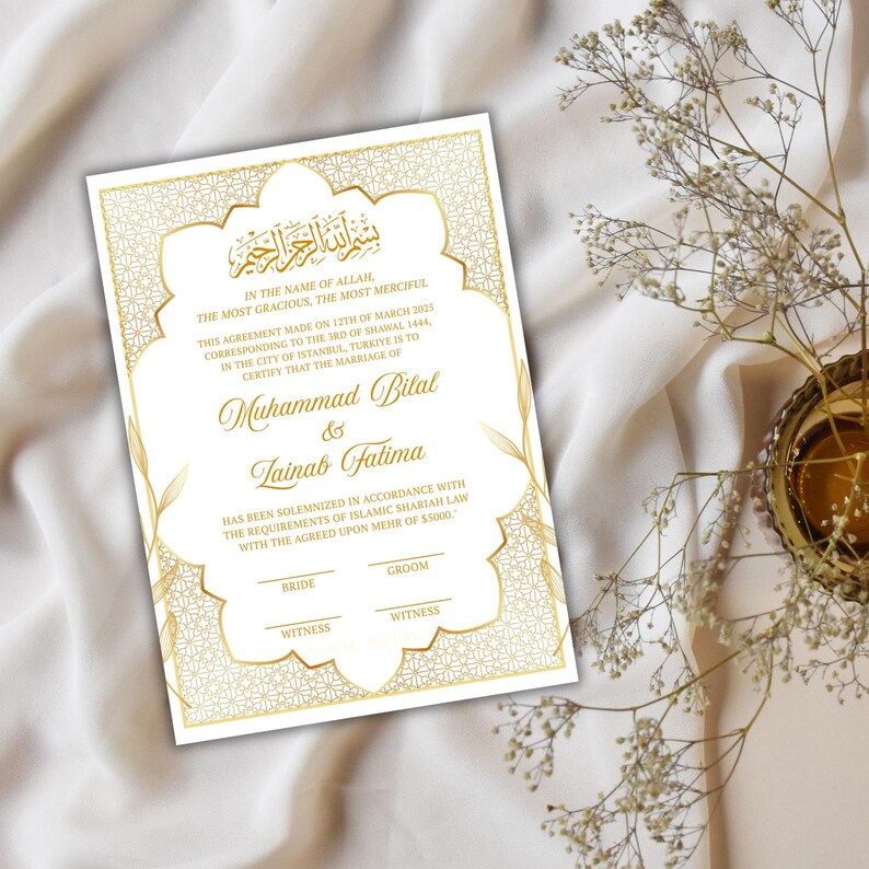 May include: A white wedding invitation with gold decorative borders and text. The invitation includes Arabic script at the top, followed by English text. The names "Muhammad Bilal" and "Zainab Fatima" are featured prominently.