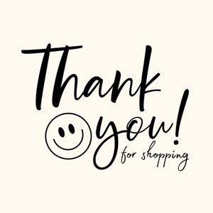 May include: A digital graphic featuring the words "Thank you!" in a black, handwritten font, a smiling face, and the phrase "for shopping" in a smaller font, set against a cream background.